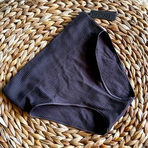 Skims stretch ribbed “fits everybody” brief.  Color: soot